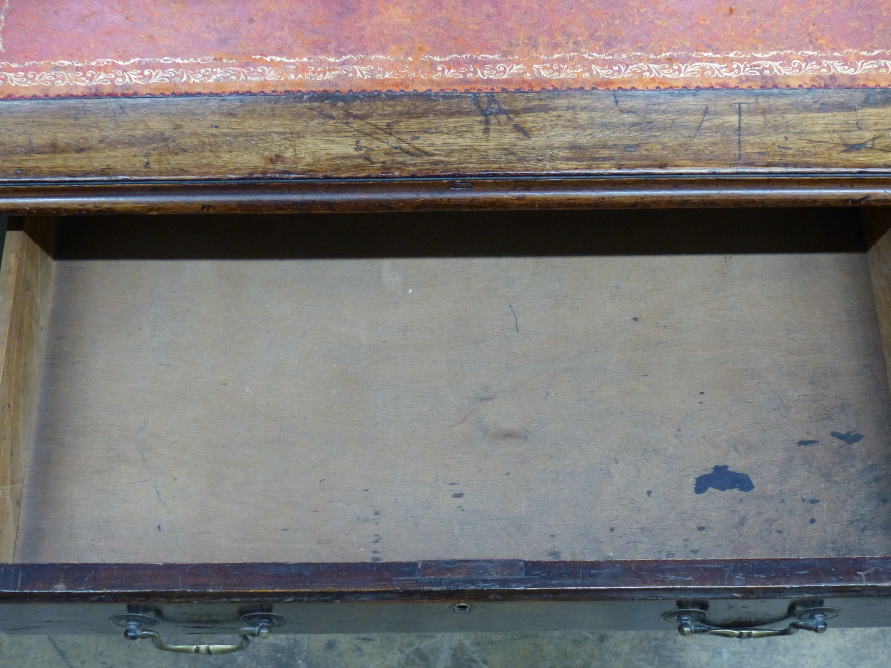 An Edwardian walnut pedestal desk, length 136cm
